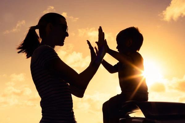 Image of happy mother and child after resolving child arrangements Bridgend